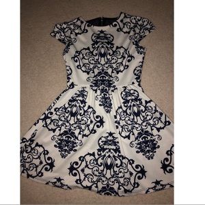 White dress w/ navy blue designs